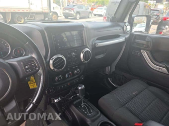 2012 Jeep Wrangler Unlimited Sahara - miniatura 10