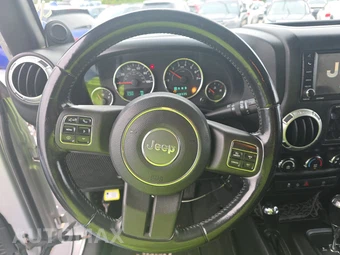2012 Jeep Wrangler Unlimited Sahara - miniatura 10