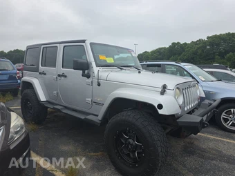 2012 Jeep Wrangler Unlimited Sahara - miniatura 3