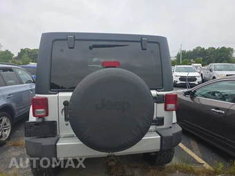 2012 Jeep Wrangler Unlimited Sahara - miniatura 5