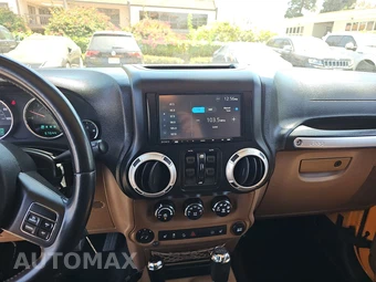 2012 Jeep Wrangler Unlimited Sahara - miniatura 11