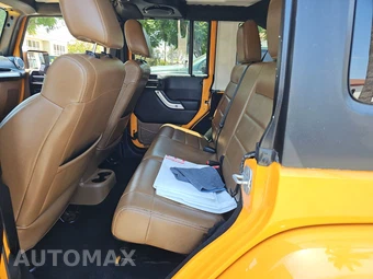 2012 Jeep Wrangler Unlimited Sahara - miniatura 13