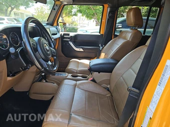 2012 Jeep Wrangler Unlimited Sahara - miniatura 7