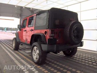 2012 Jeep Wrangler Unlimited Sport - miniatura 6