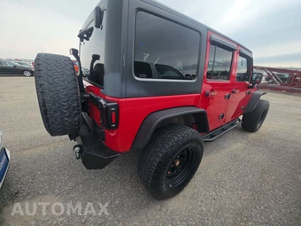 2012 Jeep Wrangler Unlimited Sport - miniatura 4