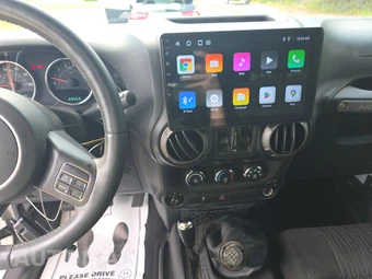 2012 Jeep Wrangler Unlimited Sport – miniatura 11