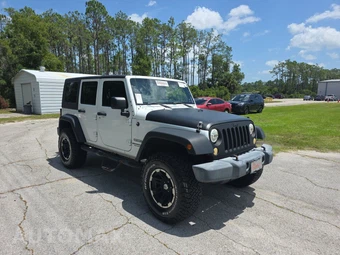 2012 Jeep Wrangler Unlimited Sport – miniatura 3