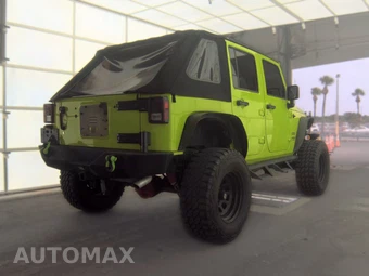 2012 Jeep Wrangler Unlimited Sport - miniatura 4