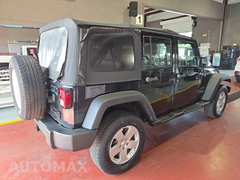 2012 Jeep Wrangler Unlimited Sport - miniatura 4