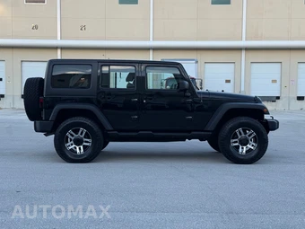 2012 Jeep Wrangler Unlimited Sport - miniatura 10