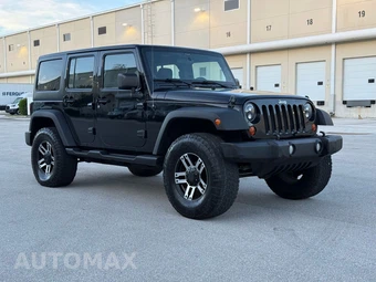 2012 Jeep Wrangler Unlimited Sport - miniatura 11