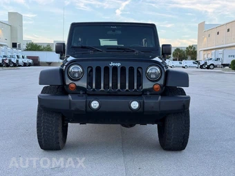 2012 Jeep Wrangler Unlimited Sport - miniatura 12