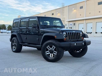 2012 Jeep Wrangler Unlimited Sport - miniatura 3