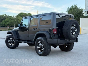 2012 Jeep Wrangler Unlimited Sport - miniatura 4