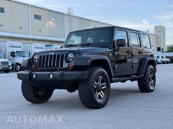 2012 Jeep Wrangler Unlimited Sport - miniatura 5