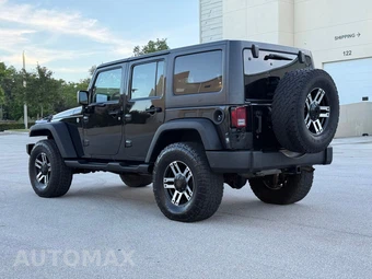 2012 Jeep Wrangler Unlimited Sport - miniatura 7