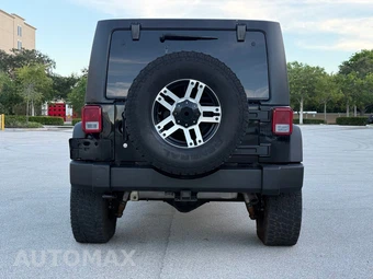 2012 Jeep Wrangler Unlimited Sport - miniatura 8