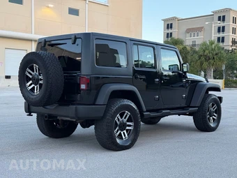 2012 Jeep Wrangler Unlimited Sport - miniatura 9
