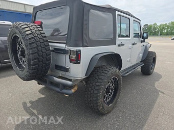 2012 Jeep Wrangler Unlimited Sport - miniatura 4