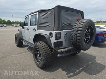2012 Jeep Wrangler Unlimited Sport - miniatura 6