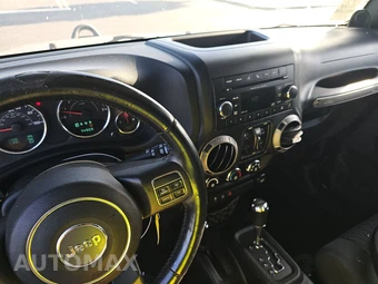 2012 Jeep Wrangler Unlimited Sport - miniatura 11