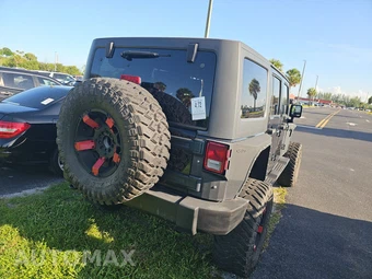 2012 Jeep Wrangler Unlimited Sport - miniatura 4