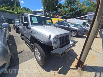 2012 Jeep Wrangler Unlimited Sport - miniatura 4