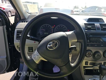 2012 Toyota Corolla LE - miniatura 10