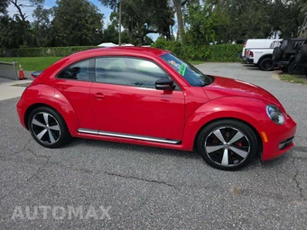 2012 Volkswagen Beetle Turbo Hatchback - miniatura 4