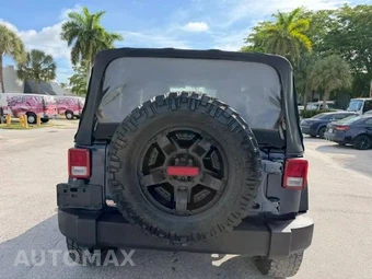 2013 Jeep Wrangler Sport - miniatura 5