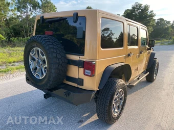 2013 Jeep Wrangler Unlimited Rubicon - miniatura 6