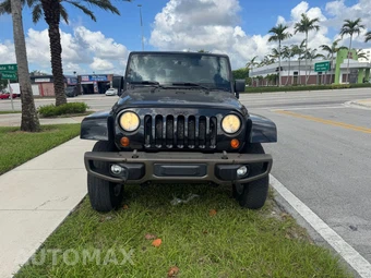 2013 Jeep Wrangler Unlimited Sahara - miniatura 3