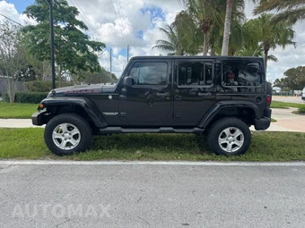 2013 Jeep Wrangler Unlimited Sahara - miniatura 6