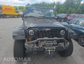 2013 Jeep Wrangler Unlimited Sahara - car from the USA, Manheim Buy-Now listing at AUTOMAX
