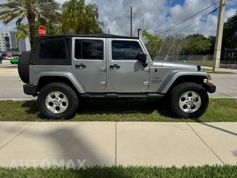2013 Jeep Wrangler Unlimited Sahara - miniatura 16