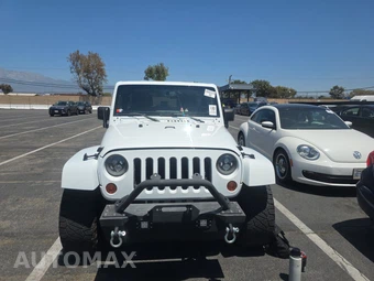 2013 Jeep Wrangler Unlimited Sahara - miniatura 2