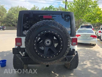 2013 Jeep Wrangler Unlimited Sahara - miniatura 11