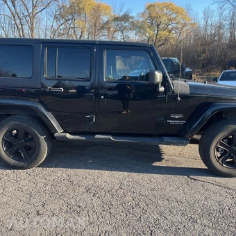 2013 Jeep Wrangler Unlimited Sahara - miniatura 11