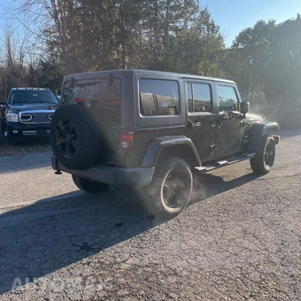 2013 Jeep Wrangler Unlimited Sahara - miniatura 8