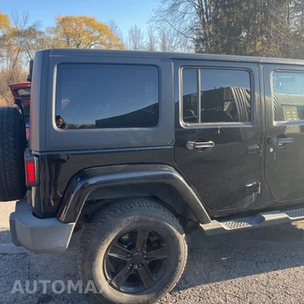 2013 Jeep Wrangler Unlimited Sahara - miniatura 9