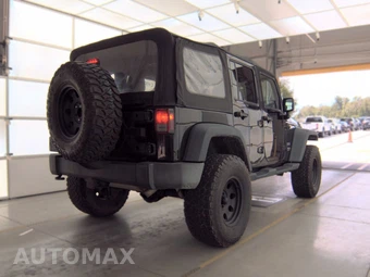 2013 Jeep Wrangler Unlimited Sport - miniatura 4