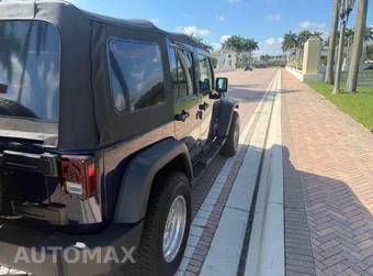 2013 Jeep Wrangler Unlimited Sport - miniatura 4