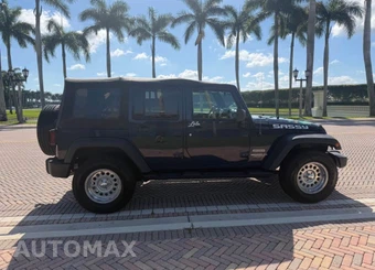 2013 Jeep Wrangler Unlimited Sport - miniatura 6