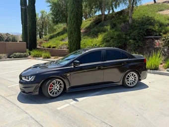 2013 Mitsubishi Lancer Evolution GSR - miniatura 2