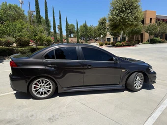 2013 Mitsubishi Lancer Evolution GSR - miniatura 4
