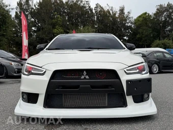 2013 Mitsubishi Lancer Evolution GSR - miniatura 6