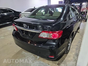 2013 Toyota Corolla L – miniatura 4