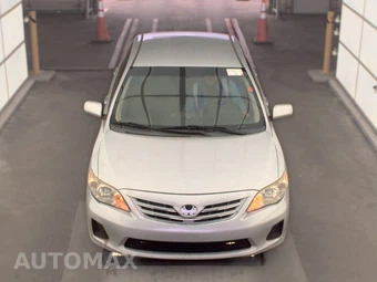 2013 Toyota Corolla LE - miniatura 2