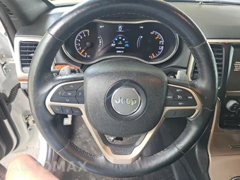 2014 Jeep Grand Cherokee Altitude Edition - miniatura 10