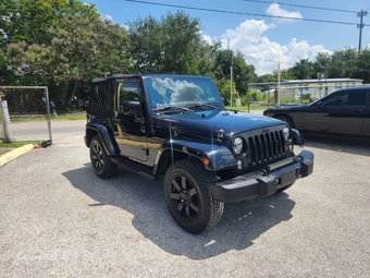 2014 Jeep Wrangler Altitude Edition - miniatura 3